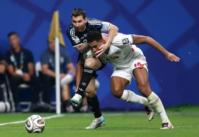 Lionel Messi holds an England player during the 2026 World Cup semi-final