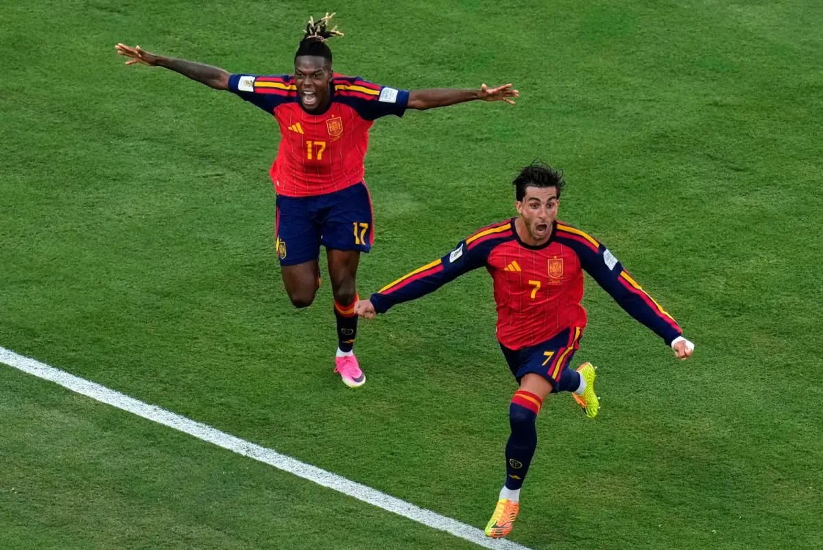 Ferran Torres and Nico Williams celebrate Spain’s winning goal from above